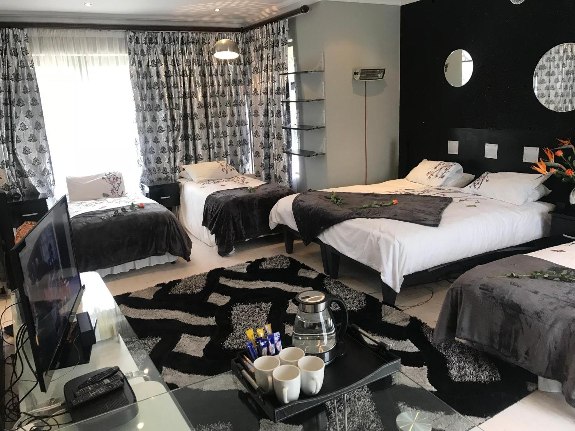Africa Paradise - Or Tambo Airport Boutique Hotel Benoni Kamer foto